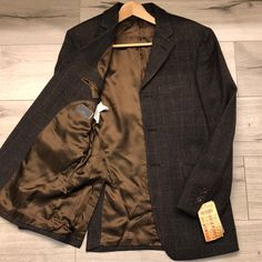 Brand New, With Tags, Never Been Used. Purchased 20 Years Ago. In Mint Condition. 3 Front Pockets. One Pocket At The Chest. 2 Internal Pockets. Material - Exterior - 100% Wool Lining - 100% Rayon Designer Fall Suits With Welt Pockets, Designer Fall Suits With Pockets, Fitted Luxury Sport Coat With Pockets, Designer Fitted Outerwear For Business, Luxury Fitted Sport Coat With Pockets, Zara Brown Single Breasted Blazer, Classic Brown Zara Outerwear, Zara Brown Single-breasted Blazer, Formal Fall Custom Fit Sport Coat