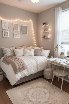 a bedroom decorated in neutrals and whites with string lights