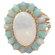 an opalite and diamond ring, by van cleef in the early 20th century