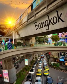 an overhead view of traffic on a busy street with the word bangkok painted on it