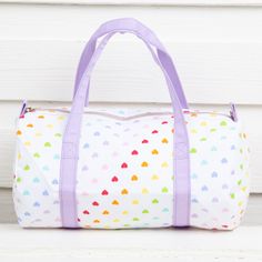 These cute little bags can carry all your child's essentials! Pick your favorite pattern, add the perfect monogram, and enjoy all the compliments. Fully lined. Measures 13" X 11.5". Preppy Travel, Small Duffle Bag, Sleepover Bag, Pink Seersucker, Duffle Bags, Birthday List, Monogram Styles, What To Pack, Softies