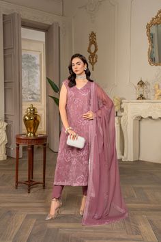 Brand: HemstitchProduct: CLE-03 ZairaCollection: Hemstitch Unstitched Luxury Chiffon CollectionFabric: Chiffon DESCRIPTION: Glamorous charm infuses this mesmerizing ensemble in lavender plum hue , A contemporary embellishment with enchanting delicate embroidery cascading over the whole attire harmonizes exquisitely with a floral embroidered Dupatta , Creating an irresistible appeal PRODUCT DETAILS: Embroidered Chiffon Shirt 2.5 Yard . Embroidered Chiffon Dupatta 2.75 Yard . Plain PK Raw Silk Pan Chiffon Collection, Embroidered Chiffon, Delicate Embroidery, Embroidered Dupatta, Chiffon Dupatta, Silk Pants, Extra Fabric, Fabric Stores Online, Chiffon Shirt