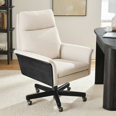 a white office chair sitting on top of a rug