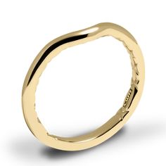 a yellow gold wedding ring with curved edges and an irregular design on the top side