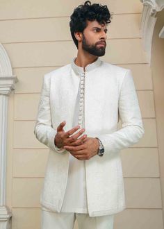 Include: Kurta Addons: Matching Pants[+PKR 2000] Jacket [+PKR 19500] plain kurta [+PKR 3500] Fabric: Kurta: Cotton Color: White Work Technique: Embroidery Description: A white cotton kurta enhanced with geometric embroidered details and loop buttons bring class and elegance to Agate. Pair it with matching trousers to make this a statement outfit. This is a 1 piece stitched outfit. Disclaimer: The color of the outfit may vary due to lightening effect of photography Plain Kurta, Haldi Function, Black Suit Men, Kurta Cotton