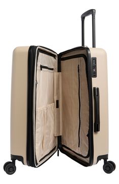 This sleek and stylish hardside luggage is fitted with a durable ABS shell and interior zip pockets to safely transport your belongings while on the move.Closure: Two-way zip closure features a TSA-friendly programmable combination lock.Exterior features: An adjustable-height trolley handle, top and side carry handles and four spinner wheels make it easy to travel through the terminal.Interior features: Zip-divided interior with pockets and compression straps keep your items organized on the mov Modern Rectangular Travel Luggage, Beige Rectangular Luggage For Overnight Trips, Beige Rectangular Luggage For On-the-go, Portable Rectangular Luggage For On-the-go, Rectangular Portable Luggage For Travel, Functional Rectangular Luggage With Protective Case, Beige Luggage With Sleeve For Overnight Trips, Modern Rectangular Luggage With Zipper Closure, Modern Hard Shell Rectangular Case