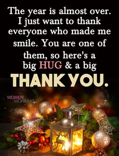 a lantern and christmas decorations with the words thank you on it, in front of a black background