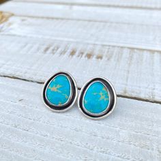 "Just An Earthbound Misfit, I" Bright blue and golden Sonoran Gem Turquoise set in fine and sterling silver in shadowbox style. Oxidized and tumbled for a dark satin finish. Earrings measure approximately 20mm tall by 18mm wide. NOTE - the earring bust shown is not life-size, please refer to measurements. Sterling silver posts with large sterling butterfly backs (not pictured). Blue Oxidized Sterling Silver Jewelry, Blue Sterling Silver Jewelry With Oxidized Finish, Unique Blue Earrings Stamped 925, Blue Sterling Silver Earrings With Polished Finish, Artisan Blue Earrings With Oxidized Finish, Blue Artisan Earrings With Oxidized Finish, Blue Polished Finish Earrings For Gift, Metal Pendant Necklace, Wrist Accessories