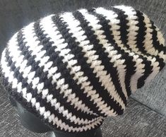 chunky crochet black and white striped beanie Handmade Black Beanie, Trendy Black Handmade Crochet Hat, Black Crochet Yarn Beanie, White Crochet Beanie Cap, Black Crochet Hat In Acrylic Yarn, White Crochet Cap Beanie, White Crochet Beanie Hat In Acrylic Yarn, Trendy Black Crochet Hat, Handmade Black Yarn Beanie