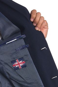 A refined slim fitted suit with a notch lapel and two button closure offers a sophisticated appearance for any occasion. Fit: this style fits true to size. S=short, R=regular, L=longJacket:. Slim fit. Notch lapel. Two button closure. Chest welt pocket. Flap pockets on front. 5 buttons on each sleeve. Side vents. Four interior pockets. Approx. 28" length. ImportedPants:. Flat front. Zip fly with hook-and-bar and button closure. Front slant pockets. Back besom pockets with button closure. Unhemmed Tailored Business Sets With Pockets, Tailored Tuxedo Suits With Pockets, Navy Suits With Button Closure For Work, Navy Notch Lapel Workwear Sets, Business Casual Suit With Button Closure, Navy Notch Lapel Sets For Workwear, Navy Suits With Pockets, Navy Suits With Welt Pockets And Lapel Collar, Navy Semi-formal Suit With Pockets