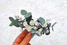 "Wedding flower comb white flower Eucalyptus bridal hair piece Pearl hair comb for women  Wedding hair piece,eucalyptus and roses bridal hair comb. Perfect wedding headpiece for your wedding hairdo. Attention, all items are handmade from foam Eva myself,Is absolutely not afraid of water, frost, sun, burnout, falling down, and will never fade. -Length 15 cm (6\") -Ready for shipment -Very light -100% hand made This eucalyptus wedding hair comb looks great at any haistyle." Eucalyptus Wedding Hair, Greenery Hair Piece, Burgundy Eucalyptus, Wedding Flower Comb, Flower Eucalyptus, Wedding Hairdo, Wedding Flower Hair, Pearl Hair Comb, Hair Piece Wedding