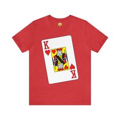 Step into the deck with our "King of Hearts" Big Face Tee. This eye-catching shirt features a bold illustration of the King of Hearts playing card, making it a standout choice for poker enthusiasts and card game lovers. Crafted from Bella Canvas 3001 fabric, it ensures both comfort and style. Elevate your wardrobe with this unique tee that combines a touch of royalty with the thrill of the game. Key Features: Made from Bella Canvas 3001 for softness. Striking King of Hearts illustration. Perfect Playing Card Shirt, Queen Of Hearts Shirt, Hearts Illustration, Bold Illustration, Hearts Playing Cards, Heart Illustration, King Of Hearts, Game Nights, Heart Tee