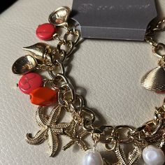 Daisy Fuentes Bracelet With Gold Shells, Starfish, Pearls & Coral Charms! So Pretty. Great For A Beach Vacation! New! Extender Makes It Bigger! Bundles & Offers Welcome! Coral Bracelet Jewelry For Beach, Coral Beach Bracelet Jewelry, Coral Colored Beach Bracelet, Summer Vacation Bracelet With Starfish Charm, Bohemian Charm Bracelet For Beach, Coral Jewelry For Summer Beach Occasions, Summer Beach Coral Jewelry, Bohemian Charm Bracelet For Beach With Lobster Clasp, Casual Bracelets With Starfish Charm For Vacation