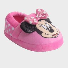 a minnie mouse slipper with polka dots on it