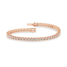 The Essential Tennis Bracelet exemplifies the magnificence of your beauty. Its string of glistening diamonds radiates luxury from every angle, and its minimalistic design makes you shine in all your glory. The diamond bracelet has a secured top GB lock that ensures the bracelet is secured and feels comfortable. Dazzling Rose Gold Bracelet For Formal Occasions, Dazzling Rose Gold Diamond Cut Bracelet, Flexible Rose Gold Diamond Bracelet, Rose Gold Diamond Tennis Bracelet Brilliant Cut, Classic Flexible Rose Gold Bracelets, Classic Rose Gold Flexible Bracelet, Classic Flexible Rose Gold Diamond Bracelet, Classic Rose Gold Flexible Diamond Bracelet, Formal Rose Gold Diamond Tennis Bracelet