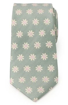 Embroidered daisies bloom neatly on a tie crafted from polished silk to elevate any look that's on the casual side of formal. 3" width; 59" length 100% silk Dry clean Imported Spring Floral Print Ties For Formal Occasions, Floral Print Ties For Spring Formal Events, Formal Floral Print Ties For Spring, Classic Floral Suit And Tie Accessories For Spring, Classic Floral Print Suit And Tie Accessories For Spring, Formal Adjustable Floral Print Suit Accessories, Elegant Green Suit And Tie Accessories For Spring, Summer Formal Ties With Floral Print, Silk Ties For Formal Summer Occasions