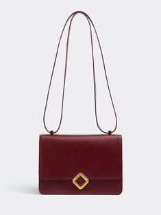 Polomi's Anina Crossbody Bag elevates a minimalist style with its bold finesse. The bag features a crown jewel inlayed cube clasp closure, an expandable gusset and a convertible shoulder strap. [tab] Composition: Box calf exterior; Nappa calf interior Size and Fit: Runs True to Size. 26cm x 18cm x 12cm. Care Instructions: Specialist Clean Origin: Made in France SKU: POL50P67 Questions about size, fit, or how to style? The KZ team is here to help you look and feel your best! Chat with our stylist Clean Origin, Crown Jewels, How To Style, Minimalist Style, Minimalist Fashion, Convertible, Care Instructions, Crossbody Bag, Top Handle Bag