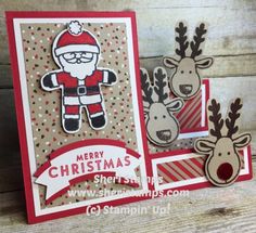 a christmas card with reindeer and santa clause on it, next to some cut outs