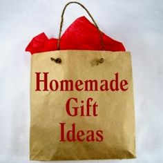 a brown paper bag with the words homemade gift ideas on it and a red bow