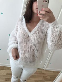 This model of the hand knitted  mohair jumper in white color is soft and comfortable.Women cable knit pullover  will look perfect as part of your casual look.This cable knit sweater made from high quality  mohair yarn. The white color of this sweater would look perfect at any time of the year.Great choise for gift ;)YARN:70%  mohair, 30 % acryliсMore sweaters here: https://etsy.me/2xT27NaSIZES:XS: widht 45 cm (17,7"), Lenght - 60  (23.6")  S: widht 48 cm (18,8"), Lenght - 60  (23.6")  M: widht 5 White Chunky Knit V-neck Sweater With Long Sleeves, Cozy Mohair Sweater In Winter White, Cozy Winter White Mohair Sweater, White Chunky Knit Long Sleeve V-neck Sweater, Cozy White Open Knit Sweater, White V-neck Cable Knit Sweater, White Soft Knit Cozy V-neck Sweater, White Hand Knitted Acrylic Sweater, White Hand-knitted Acrylic Sweater