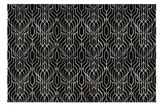 an abstract black and white pattern with wavy lines