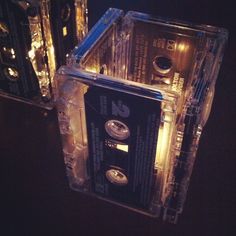 two clear cassettes sitting on top of each other