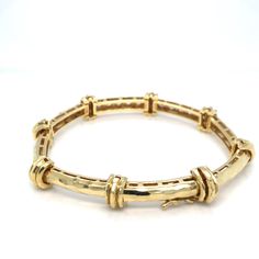 Estate Henry Dunay Diamond Bamboo Bracelet in 18K Yellow Gold. The bracelet features approximately 2ctw of brilliant cut round diamonds. 7" Length28.77 Grams Bamboo Bracelet, Precious Metals, Round Diamonds, Diamonds, Yellow Gold, Bracelet, Yellow, Gold