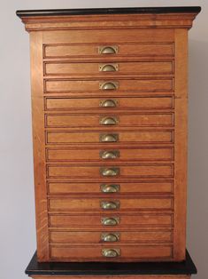 an old wooden drawer with many drawers