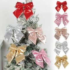 a small christmas tree with several bows on it's top and four different colors