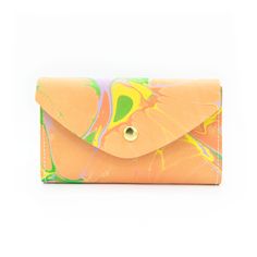 Marbled Colorful PalettesTHE wallet. Functions like a dream, holds all you need, doubles as a clutch. Available in a myriad of colorful leather options, so you can choose the one that is perfectly you. This classic design features 6 credit card slots, a compartment for organizing bills and receipts, and a back zippered coin pocket— all in a slender silhouette. The sleeve of this wallet also holds your phone, so feel free to carry it solo anytime you feel like getting dressed up. Available in sof Everyday Multicolor Bifold Wallet, Multicolor Card Slots Clutch For Everyday Use, Everyday Multicolor Clutch With Card Slots, Multicolor Clutch With Card Slots, Multicolor Clutch Wallet For Everyday Use, Multicolor Everyday Clutch Wallet, Everyday Multicolor Clutch Wallet, Multicolor Clutch Coin Purse With Card Slots, Multicolor Clutch Wallet With Card Slots