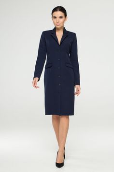 "This blazer dress would be perfect for the office or any other event that requires a more business casual dress code. - Button front fitted jacket dress - Lapel collar - Knee length (midi) - Long sleeves - With black metal buttons - Fully lined - Color: navy blue Fiber: 60% viscose, 35% polyester, 5 % elastane, lining - 95 % viscose, 5% elastane. Estimated shipping time: 10-12 business days For size S:dress length- 40,0 \" (102 cm), sleeve length 24\" (61 cm) Our model wears size S (US 6) and i Professional Blazer Dress With Notch Lapel For Semi-formal Occasions, Professional Blazer Dress For Semi-formal Occasions With Notch Lapel, Professional Semi-formal Blazer Dress With Notch Lapel, Blue Notch Lapel Skirt Suit For Office, Professional Blazer Dress For Semi-formal Occasions, Tailored Blue Skirt Suit For Business, Blue Tailored Skirt Suit For Business, Fitted Blue Blazer Dress With Notch Lapel, Blue Notch Lapel Skirt Suit For Formal Occasions