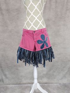 "Upcycled women's pink denim shorts with frayed fringe hem and floral detail. Waist measures 37\"." Denim Patchwork Jacket, Upcycled Denim Jacket, Pink Denim Shorts, Bleached Denim, Pink Denim, Patchwork Jacket, Upcycled Denim, Crochet Poncho, Denim Patchwork