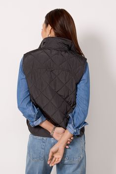 The Cooper vest by EVEREVE is the perfect transitional layer, crafted in quilted nylon with side pockets, a stand collar, and front zipper and snap closures. Pair with any fall-forward look from sweaters to button-downs. | EVEREVE Women's Cooper Quilted Vest, Size XS, Black Fall Forward, Quilted Vest, Front Zipper, Stand Collar, Zipper, Collar, Black