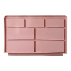 a pink tray with compartments on it