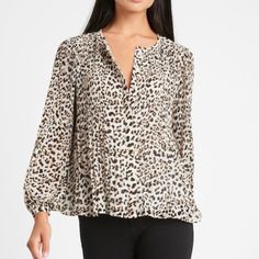 Soft, Sheer Georgette Lined Body. Unlined Sleeves. Delicate Pleats- Crisp Pleats At The Shoulders Create An Effortless Drape For This Flowing Top. Button Front. Crew Neck. Semi-Fitted. Long Sleeves. Cheetah Print Original Price $89.50 Trendy Leopard Print V-neck Blouse, Leopard Print Tops For Spring, Chic Tiger Print Tops For Spring, Leopard Print Blouse For Fall, Chic Leopard Print Long Sleeve Tops, Trendy Long Sleeve Leopard Print Blouse, Chic Long Sleeve Leopard Print Top, Chic Leopard Print Tops For Work, Casual Long Sleeve Tiger Print Tops