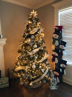 a decorated christmas tree in a living room