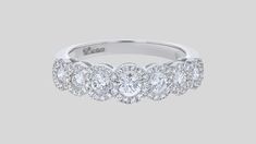 Design A new version of our best selling princess diamond halo half band ring, The...