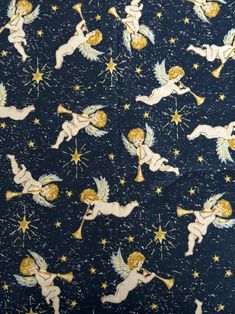 the fabric has angels and stars on it