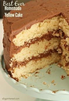 there is a cake that has been cut in half on a plate with the words best ever homemade yellow cake