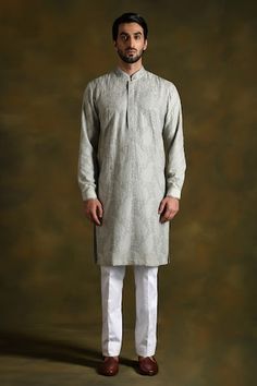 Pearl grey kurta features jaal embroidery with a diagonal pattern on the arms and a Mughal-inspired design. Comes with a matching stole and white trousers. - Aza Fashions Traditional Kurta With Embroidered Sleeves For Transitional Season, Cotton Silk Traditional Wear With Embroidered Sleeves For Eid, Cotton Traditional Wear With Embroidered Sleeves, Traditional Wear With Embroidered Sleeves For Eid, Traditional Kurta With Embroidered Sleeves For Eid, Fitted Kurta With Embroidered Sleeves And Traditional Drape, Diwali Straight Kurta With Embroidered Sleeves, Eid Cotton Silk Kurta With Embroidered Sleeves, Designer Embroidered Kurta With Traditional Drape