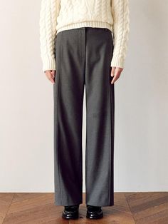 These fleece pants offer a minimal yet distinctive silhouette, perfect for daily wear with various tops. The slit detailing along the leg lines creates a longer and straighter look.- Features a semi-wide fit for comfort and style- High rise design that makes your legs enlogated- Made with fleece-treated TR blended material for a soft touch and added warmth Relaxed Fit Straight Silhouette Bottoms For Work, Minimal Stretch Wide Leg Pants For Fall, Loose Fit Wide Leg Pants With Straight Hem, Fall Full Length Pants With Minimal Stretch, Seam Detailed Pants For Workwear, Business Casual Straight Silhouette Bottoms For Fall, Winter Solid Color Straight Hem Pants, Solid Color Straight Hem Winter Pants, Winter Solid Straight Hem Pants