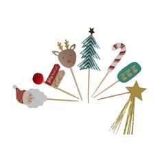 christmas photo props are arranged in the shape of an xmas tree and santa clause