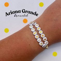 The perfect bracelet to wear as a fan of Ariana Grande.  All bracelets are handmade to order.  Please message me with any specific size measurements, standard bracelet size is approximately 7inches. White Spiritual Beaded Bracelets For Friendship, Spiritual White Beaded Bracelets For Friendship, Personalized Adjustable Beaded Bracelets As Souvenir, Spiritual Personalized Beaded Bracelets For Friendship, Spiritual Custom Name Friendship Bracelets, Handmade White Name Bracelet For Friendship, White Rosary Bracelet With Round Beads For Friendship, White Spiritual Hand-strung Friendship Bracelets, Handmade Symbolic Beaded Bracelets For Friendship