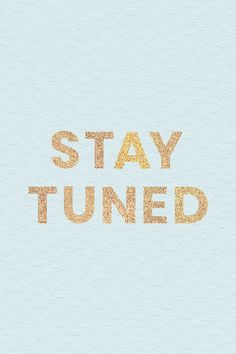 the words stay tuned written in gold on a light blue background with an orange stripe