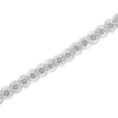 Elegante y atemporal, esta preciosa pulsera de eslabones de plata de ley presenta un peso total de 0,5 quilates de diamantes redondos con la friolera de 66 piedras en total. El brazalete de tenis presenta eslabones redondos con diamantes incrustados en nuestro exclusivo engaste de placa milagrosa, que centra cada diamante genuino en un marco con acabado de espejo y alto pulido que da la ilusión de una piedra mucho más grande. El brazalete de 7Ã¢â‚¬Â se cierra con una caja con lengüeta y cierre de seguridad y está elaborado con auténtica plata de ley 92,5% que ha sido electrorrecubierta con rodio genuino (un metal de la familia del platino), lo que garantiza que no se deslustre. Brillo libre en los años venideros. ¡Esta pulsera de tenis clásica y delgada es un gran regalo para cualquier oca Fine Jewelry Silver Tennis Bracelet With Diamond Accents, Silver Diamond Bracelet Round Cut, Silver Diamond Bracelet With Pave Setting, Silver Diamond Bracelet With Round Cut, Sterling Silver Diamond Bracelet With Pavé Setting, Anniversary Diamond Sterling Silver Bracelet, White Diamond Bracelet With Sparkling Stones In Sterling Silver, Silver Tennis Bracelet With Pavé Setting, Silver Tennis Bracelet With Pave Setting