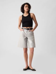 Fit: Low slung on the waist and relaxed at the hip with a wide-leg finish.   ​ Fabric: 89% Cotton, 8% Elasterell, 3% Spandex.  Stretch:A bit of hug and a lot of hold.   ​Comfortable and designed to flatter.   ​ Rise: Mid Rise Shorts.  Look: A classic five-pocket short in a silver-coated metallic denim wash.  Details: Zip fly & five-pocket styling.  Responsibly Made: This denim short is part of our water-saving Washwell program.  Compared with conventional wash methods, Washwell uses at least 20% Metallic Denim, Water Saving, Mid Rise Shorts, Silver Coat, Break In, Denim Short, Stretch Shorts, Shorts With Pockets, Denim Wash