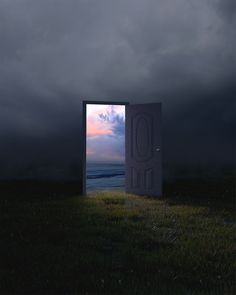 an open door in the middle of a field