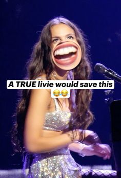 a woman with her mouth open standing in front of a microphone and holding a keyboard