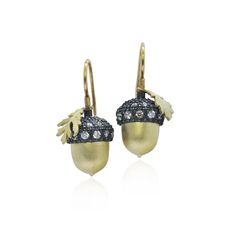 Gold, Silver & Stone Earrings - An homage to the mighty oak tree, these earrings feature a duo of silver and gold acorns with diamond-encrusted caps. Each acorn has a body and leaf made of 18k yellow gold, topped with an oxidized sterling silver and diamond cap, and completed with 18k yellow gold earring wires. Total diamond weight: 0.70 carats. Acorn Jewelry, Acorn Earrings, Mighty Oaks, Body Adornment, Earring Wires, Artful Home, Gold Earring, Yellow Gold Earring, Pearl Diamond