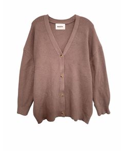 This Grandpa cardigan sweater in mocha is the perfect item for your wardrobe! Its slightly oversized silhouette and soft, cozy single rib knit will keep you comfortable during fluctuating temperatures and changing seasons. Plus, the 4 buttons and v-placket closure along with a pleat on the cuff creates a stylish blouson sleeve look - so cute! A plus size cardigan that's easy to pair with your favorite tank top or dress BAACAL Grandpa Cardigan in Mocha | mocha | Tops | Materials & Care Instructions: ['50% Viscose, 30% Nylon, 20% Polyester', 'Made in USA'] Brown V-neck Cardigan For Loungewear, Cozy Brown Ribbed Cardigan, Oversized Ribbed V-neck Outerwear, Oversized V-neck Ribbed Outerwear, Brown Soft Knit Cardigan For Loungewear, Oversized Brown Cardigan For Loungewear, Cozy Brown Sweater Coat For Everyday, Oversized Brown Cardigan With Buttons, Oversized Everyday Button-up Sweater